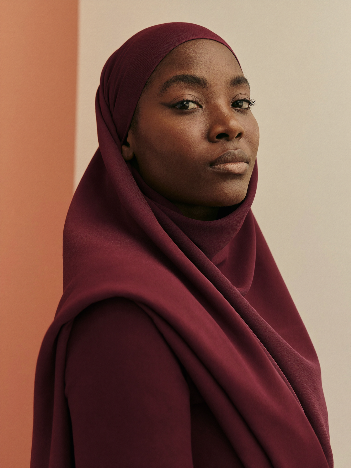 Signature Jersey Hijab worn by Zainab, burgundy