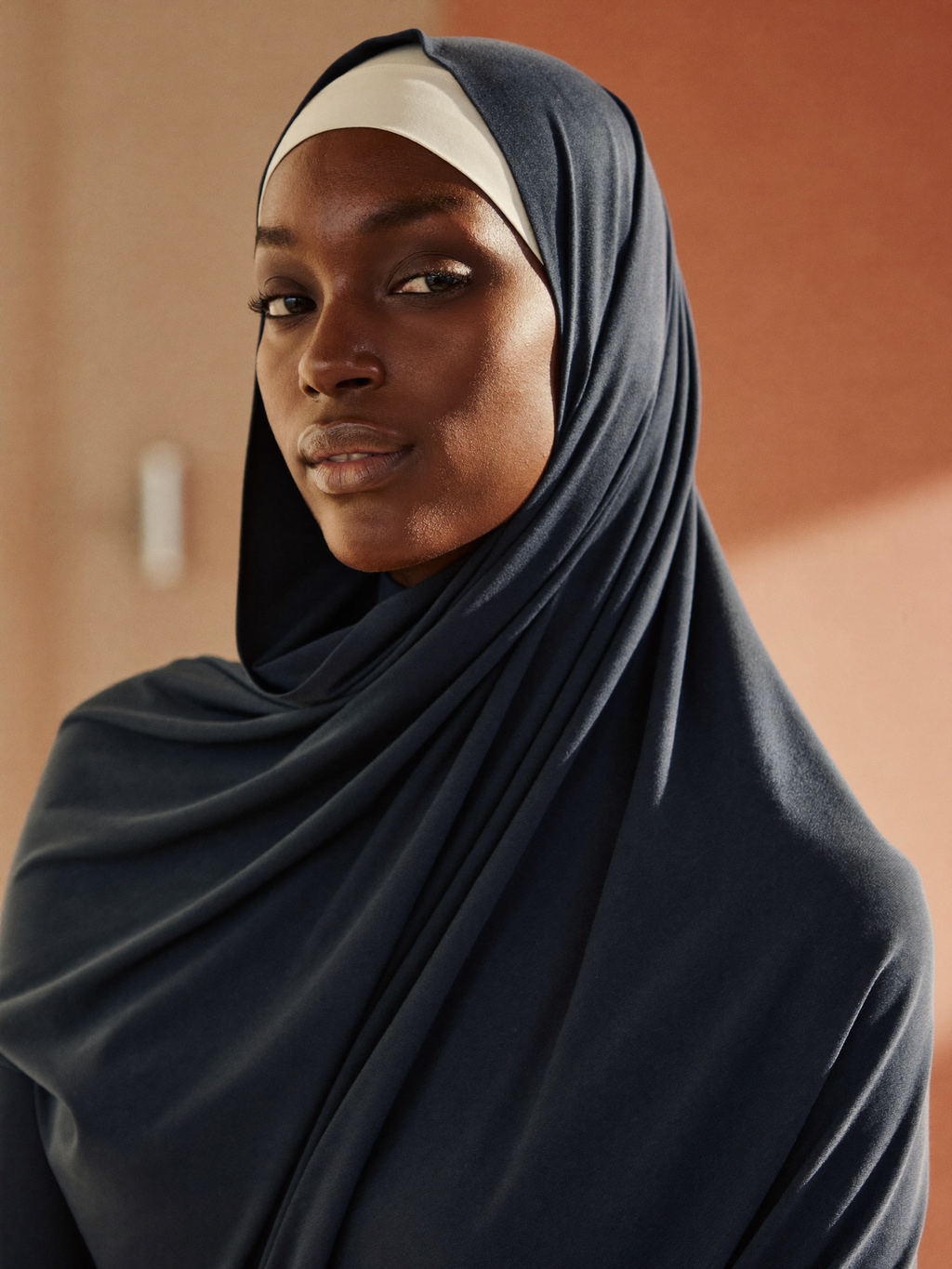 Signature Jersey Hijab worn by Zainab, navy