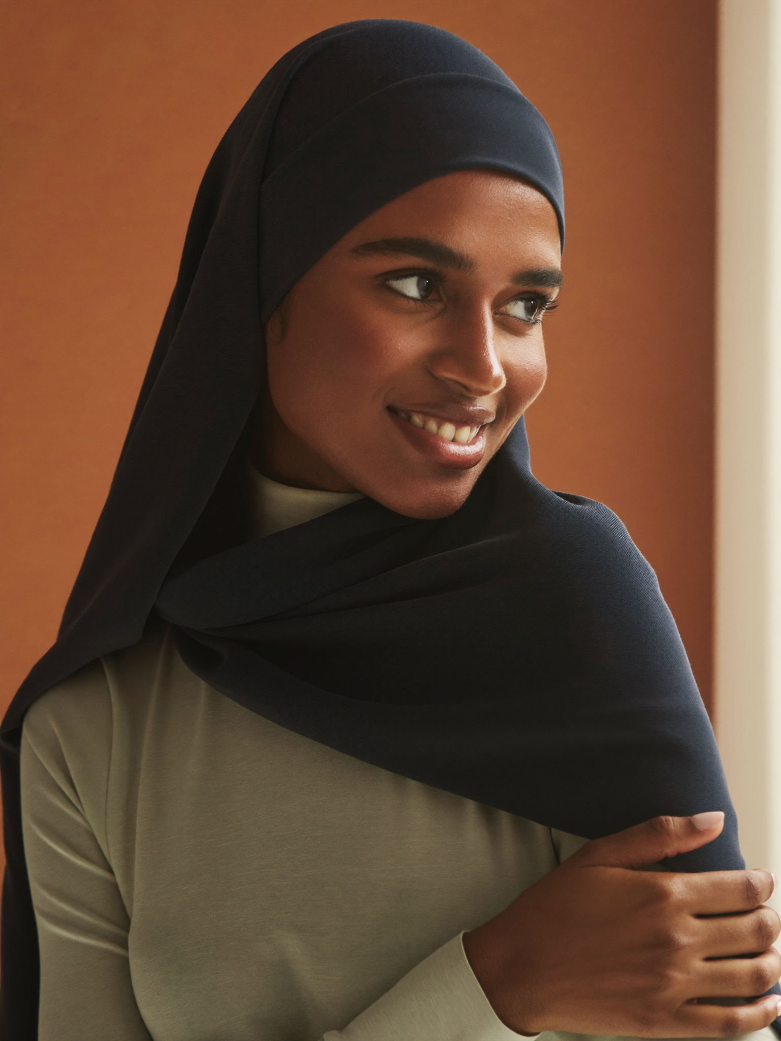 Signature Jersey Hijab worn by Fatima, navy