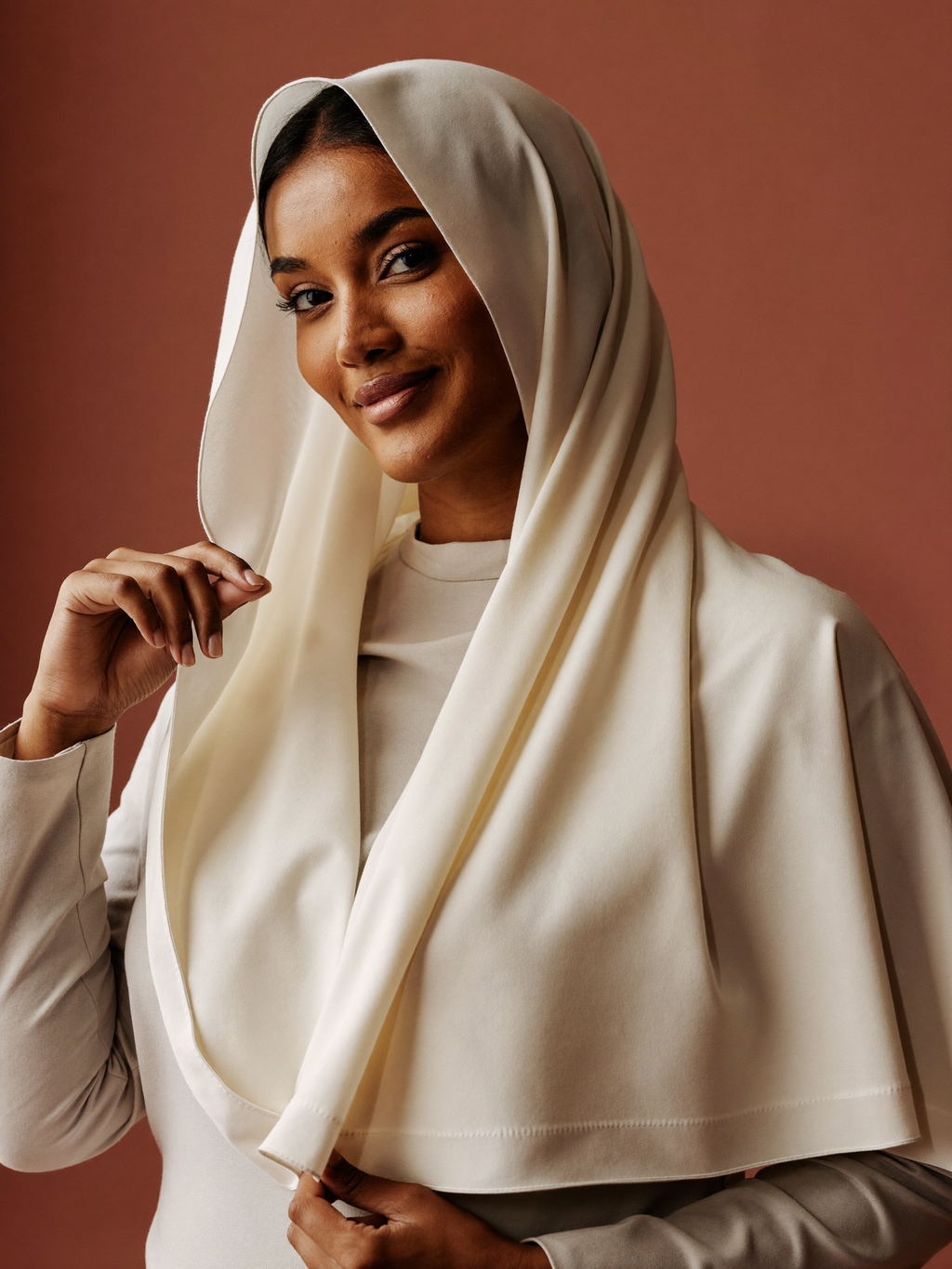Rolled-edge mercerized cotton scarf worn by Khadija
